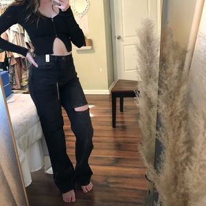 Vibrant denim in the vintage black wash. Some distressing.